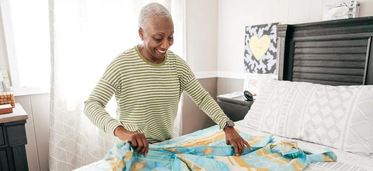 Woman folding laundry