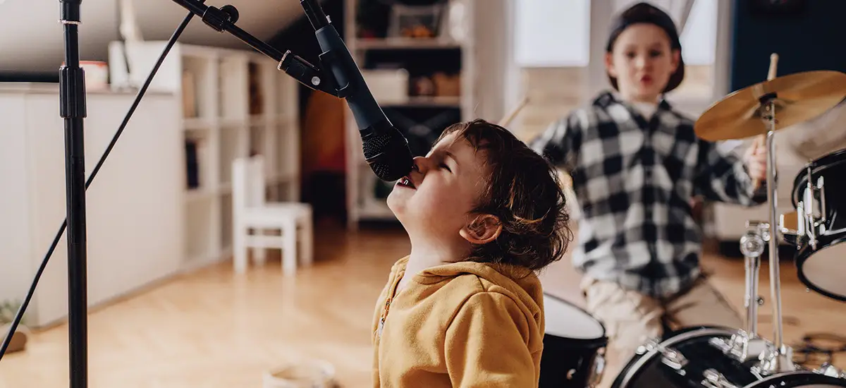 children playing music and singing